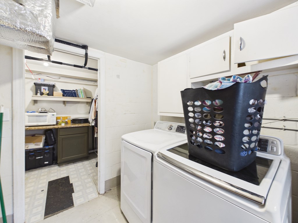 1608 39th Street Columbus, GA 31904 - Photo 42 of 63 a kitchen with stainless steel appliances a refrigerator and a stove