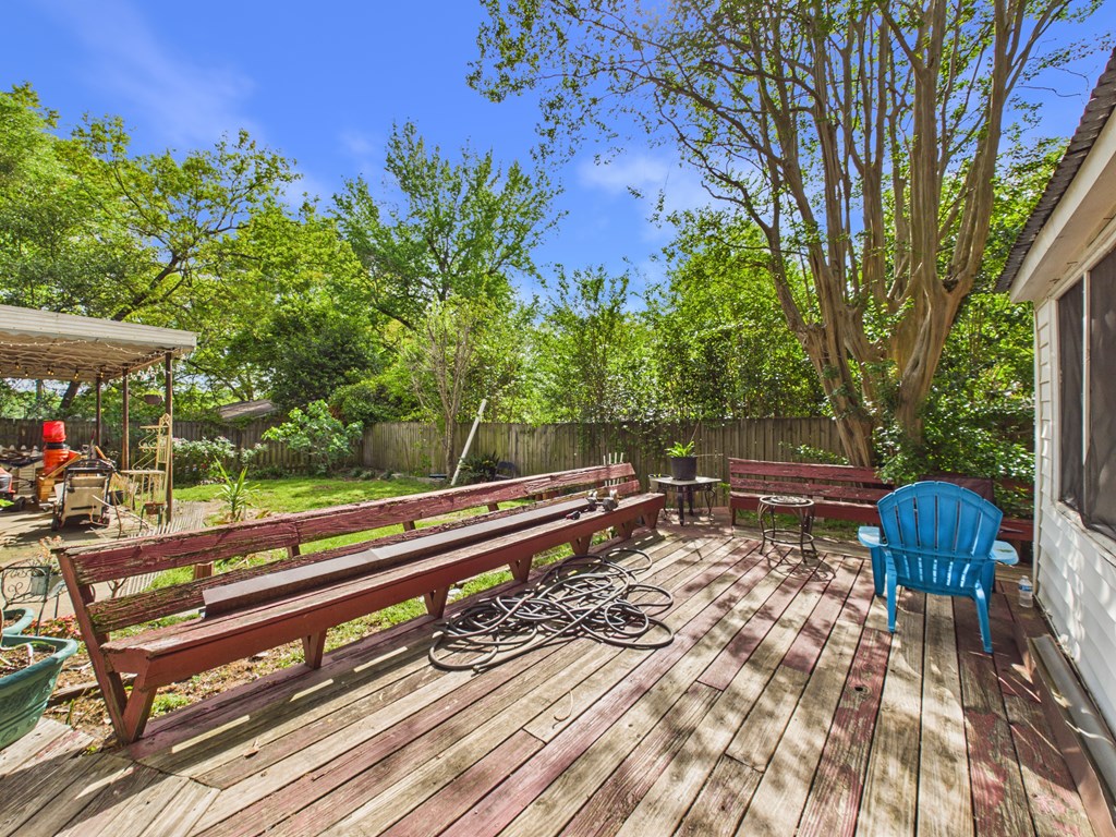 1608 39th Street Columbus, GA 31904 - Photo 47 of 63 a view of a bench in a backyard