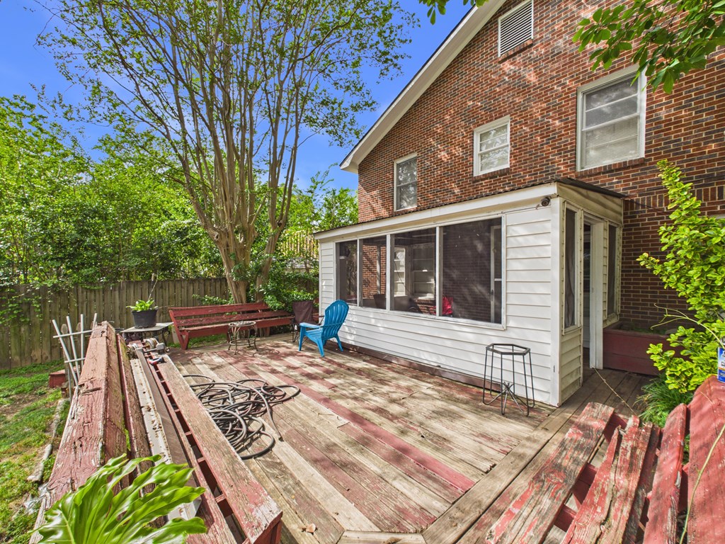 1608 39th Street Columbus, GA 31904 - Photo 48 of 63 a view of a house with backyard and sitting area