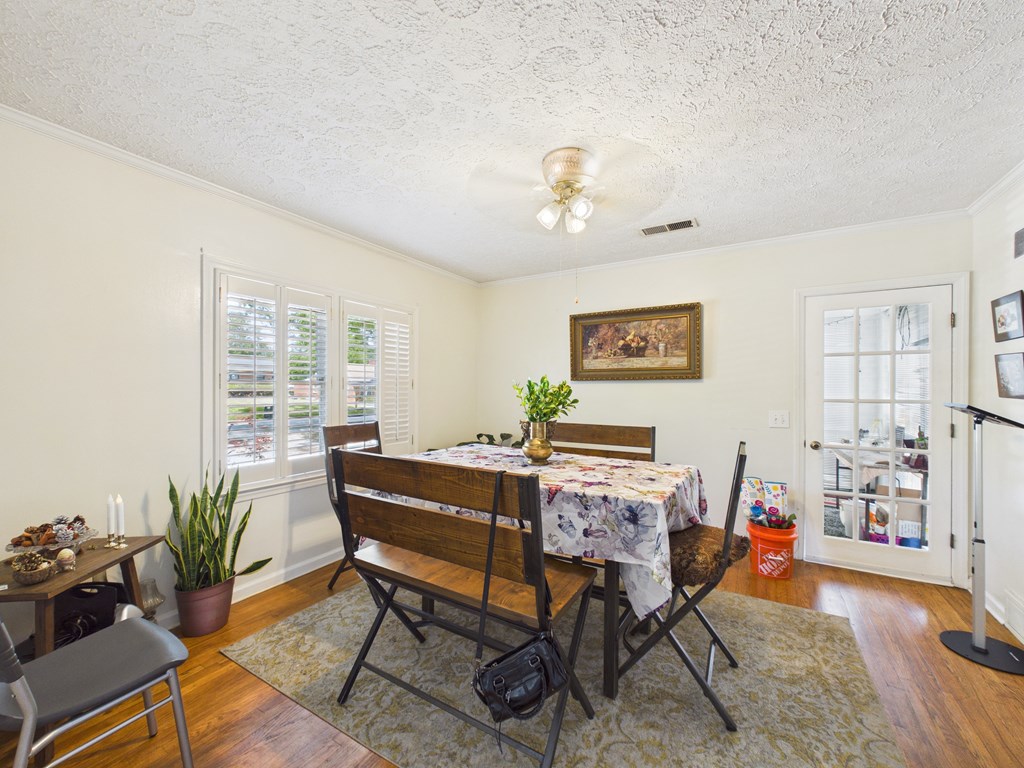 1608 39th Street Columbus, GA 31904 - Photo 5 of 63 a view of a livingroom with furniture and a potted plant