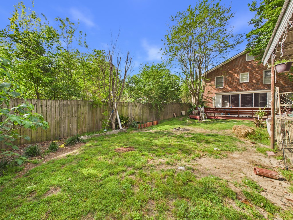 1608 39th Street Columbus, GA 31904 - Photo 57 of 63 a view of a house with a yard