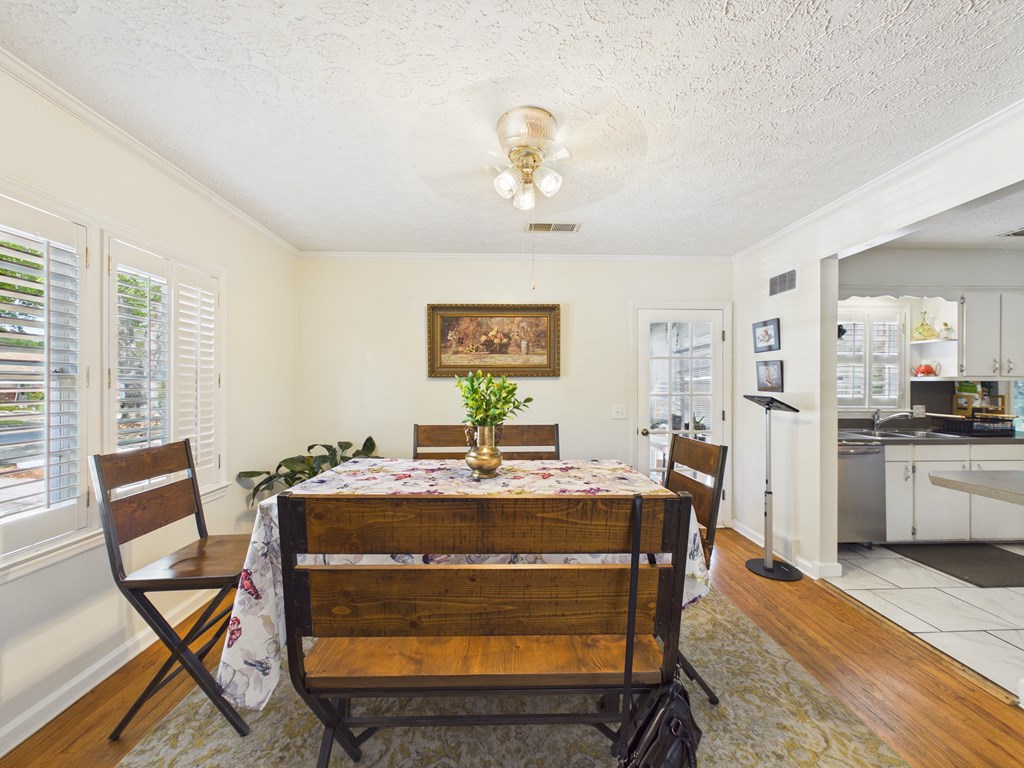 1608 39th Street Columbus, GA 31904 - Photo 6 of 63 a view of a dining room with furniture and a chandelier