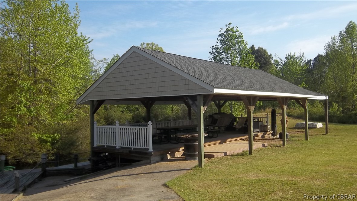 705 Greys Point Road Topping, VA 23169 - Photo 14 of 46 outside rec room and bbq