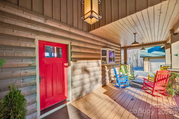 a view of front door with outdoor seating