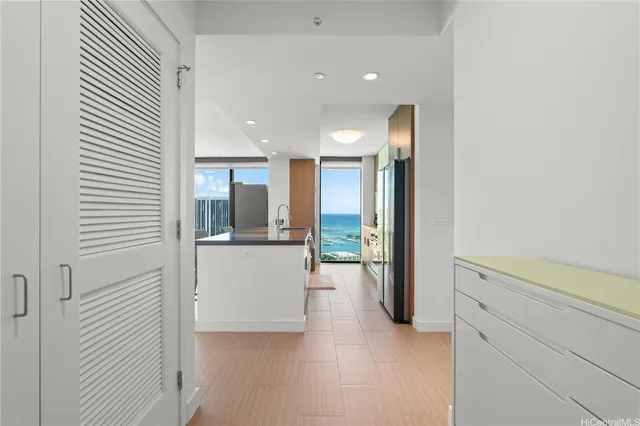 a bathroom with a tub and sink