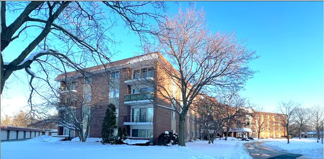 a view of a building with a snow in the city