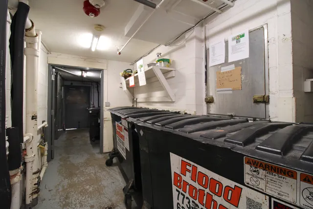 a stove top oven sitting inside of a kitchen