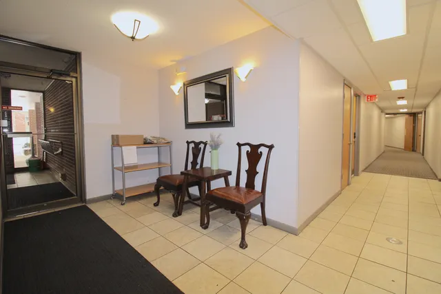 a view of a livingroom with furniture and a couch