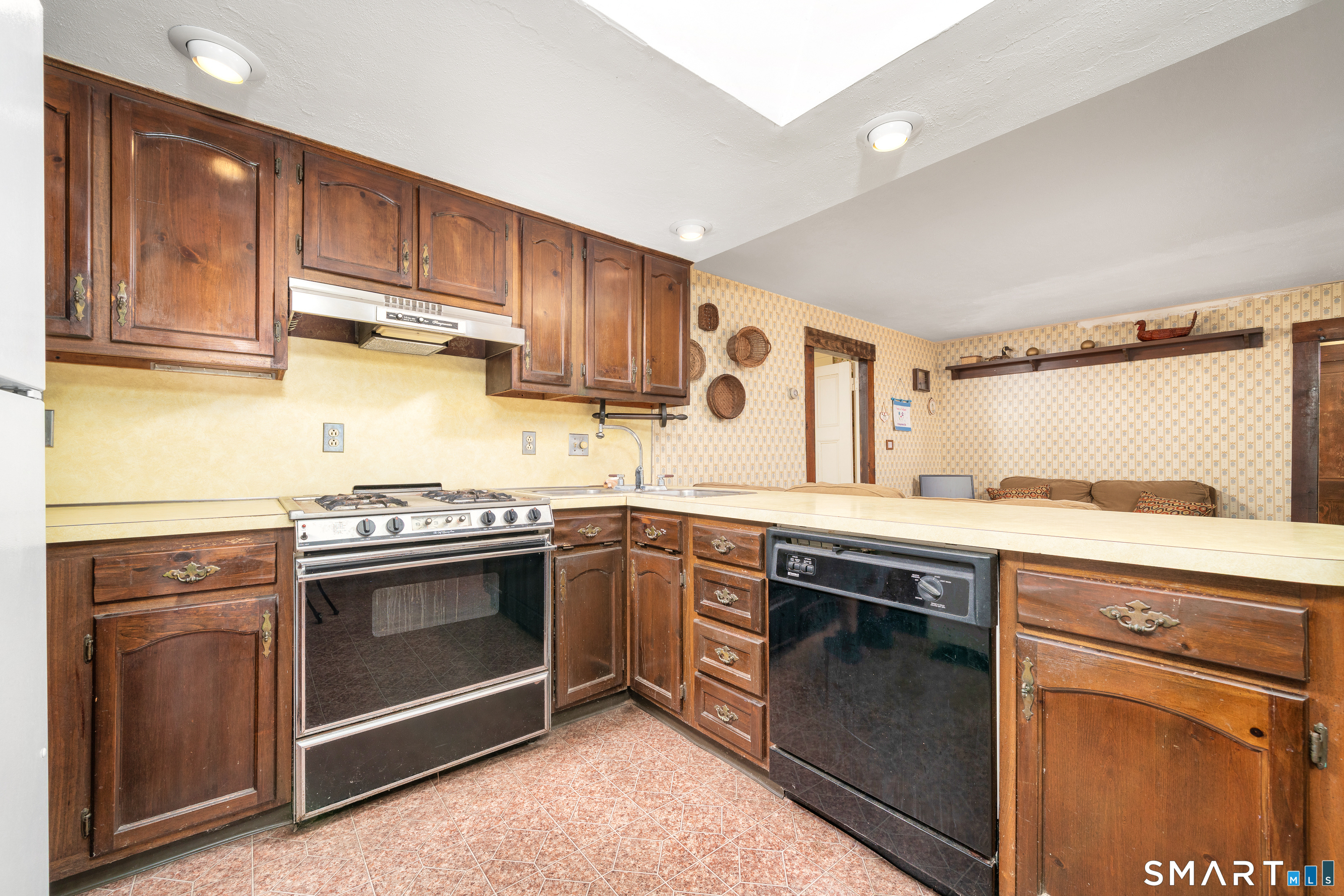 29 South Main Street Windsor Locks, CT 06096 - Photo 6 of 34 Kitchen has large skylight which brings in so much brightness