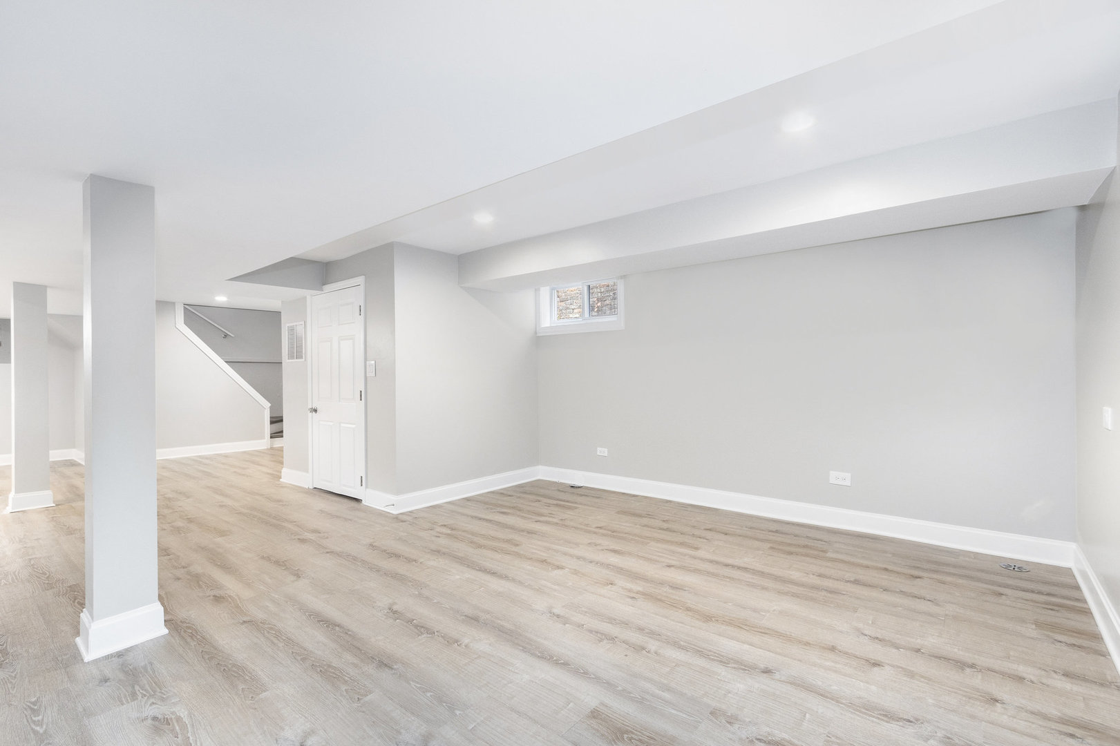1901 West 71st Street Chicago, IL 60636 - Photo 11 of 25 a view of an empty room with wooden floor
