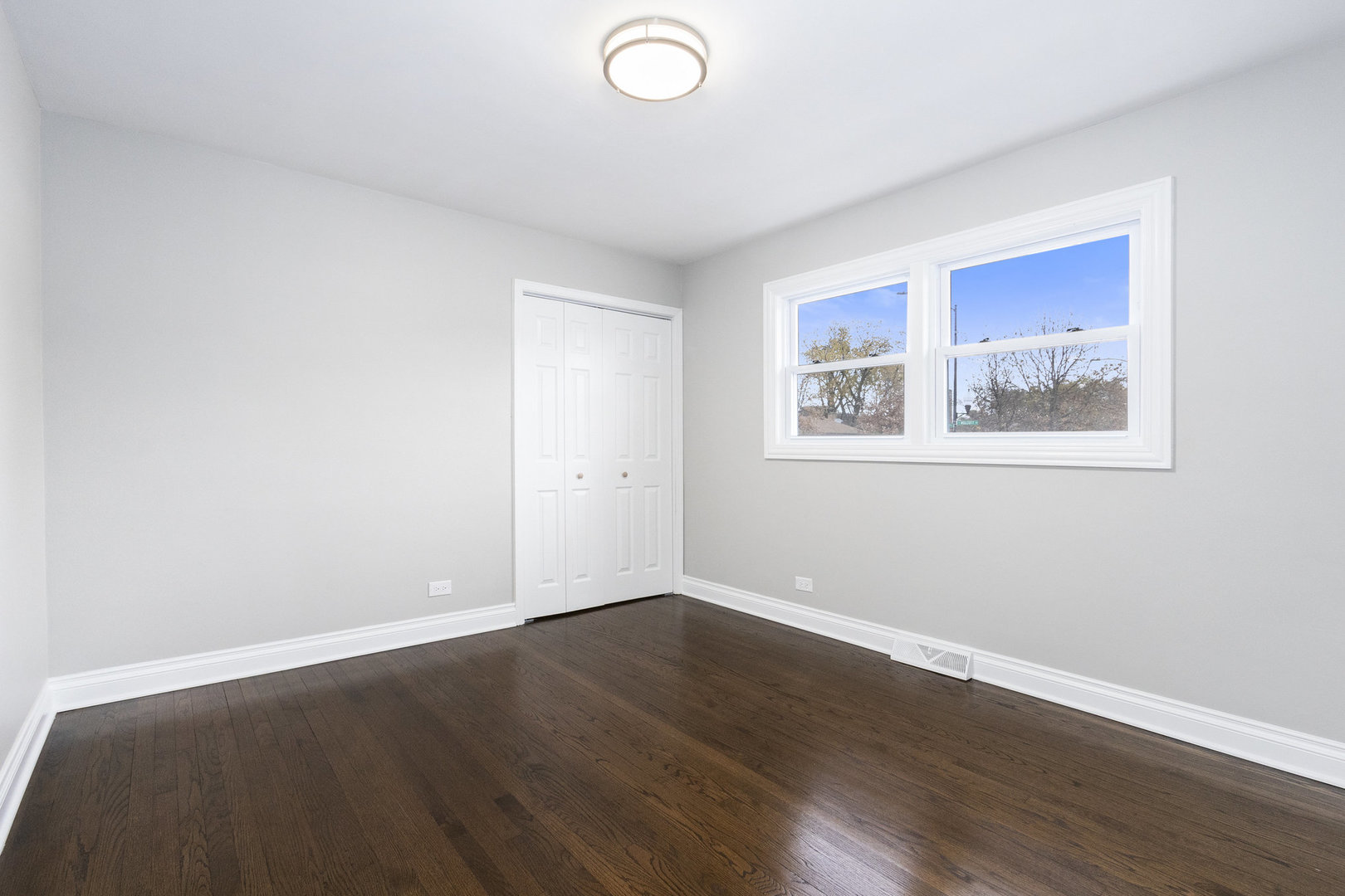 1901 West 71st Street Chicago, IL 60636 - Photo 14 of 25 a view of a room with wooden floor and window