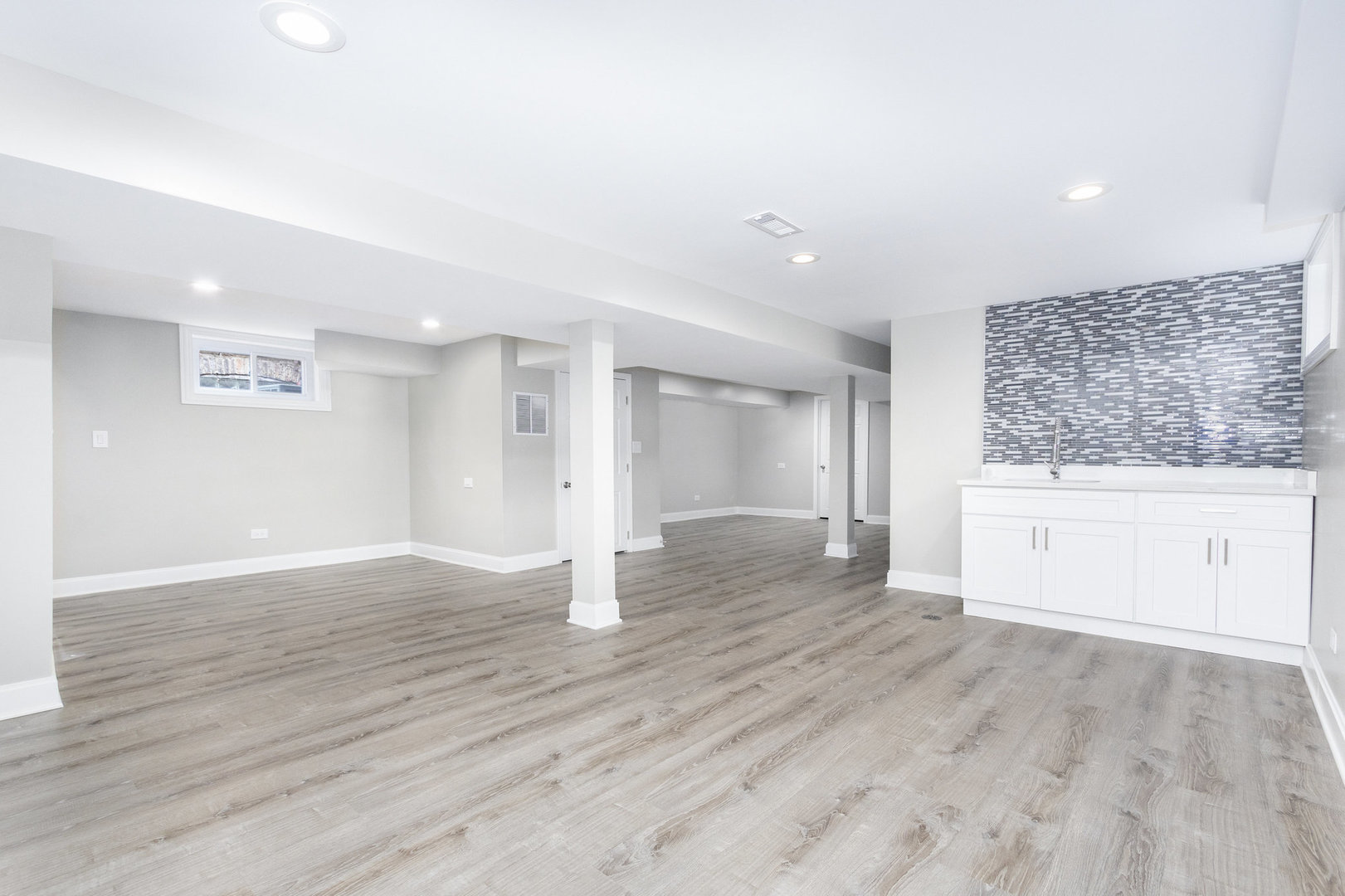 1901 West 71st Street Chicago, IL 60636 - Photo 9 of 25 a view of a kitchen with wooden floor and electronic appliances