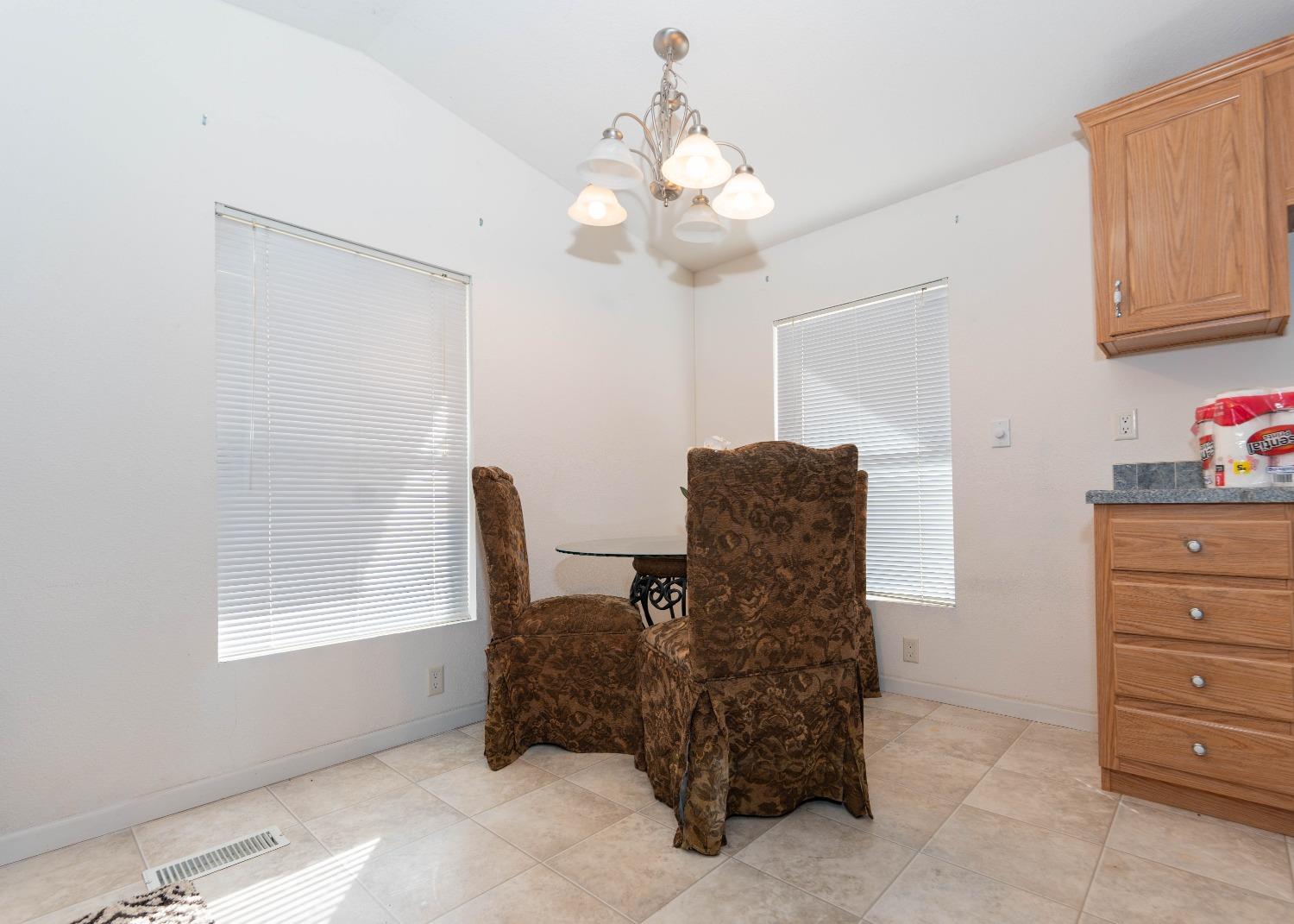 40778 Iris Road Squaw Valley, CA 93675 - Photo 11 of 44 a workspace with furniture and dresser