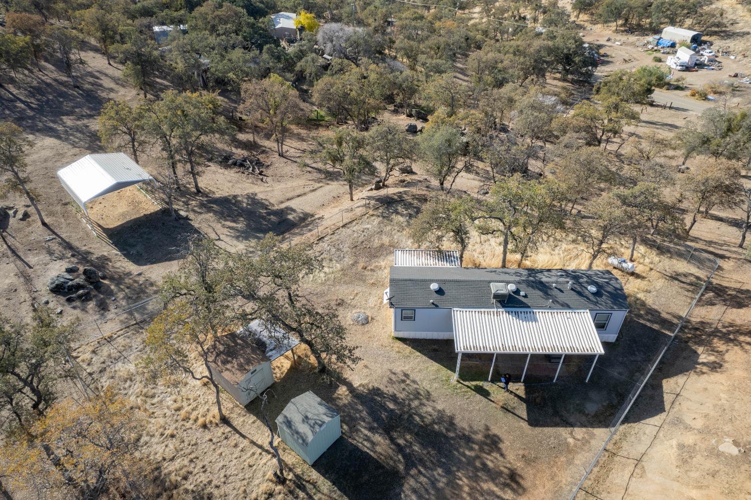 40778 Iris Road Squaw Valley, CA 93675 - Photo 35 of 44 an aerial view of a house with a yard