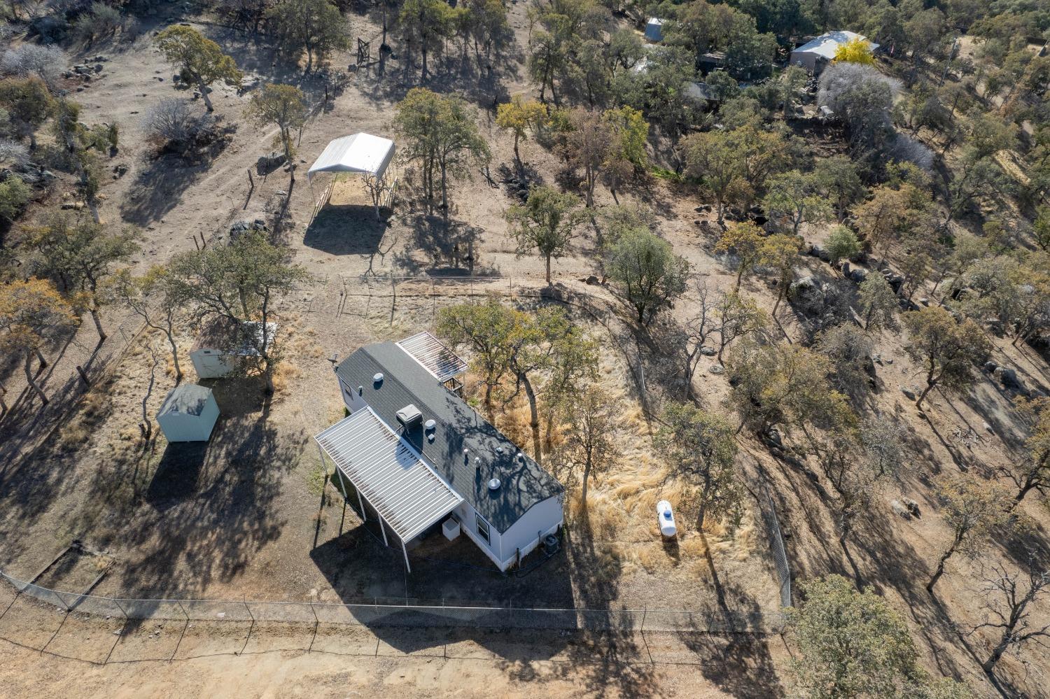 40778 Iris Road Squaw Valley, CA 93675 - Photo 39 of 44 a aerial view of a house with a yard