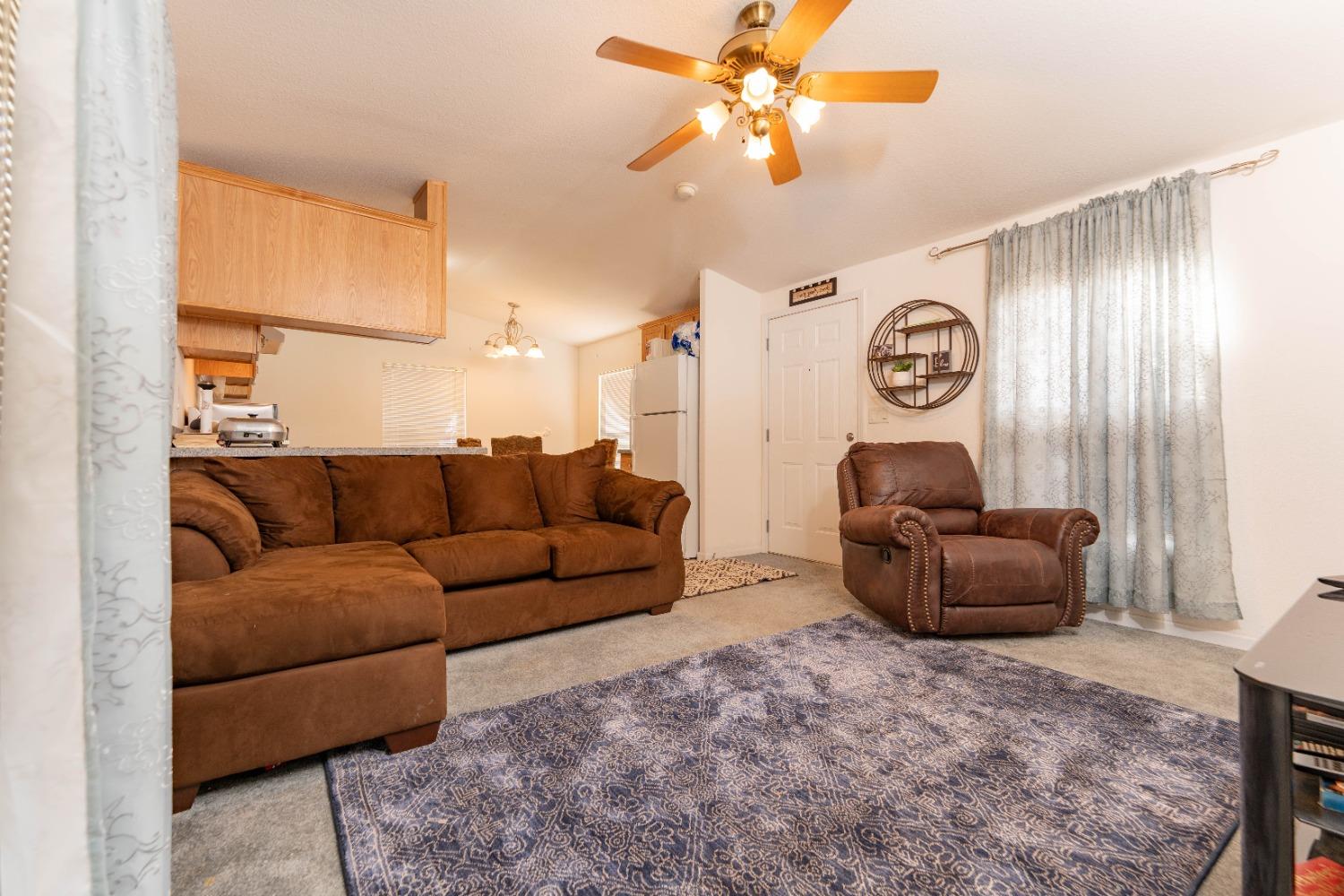 40778 Iris Road Squaw Valley, CA 93675 - Photo 9 of 44 a living room with furniture and a window