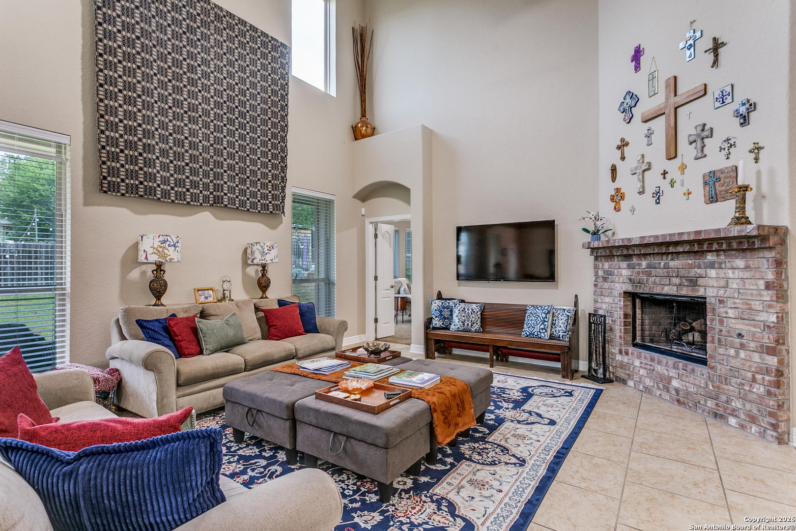 701 Morningside Drive Terrell Hills, TX 78209 - Photo 12 of 47 a living room with furniture a flat screen tv and a fireplace