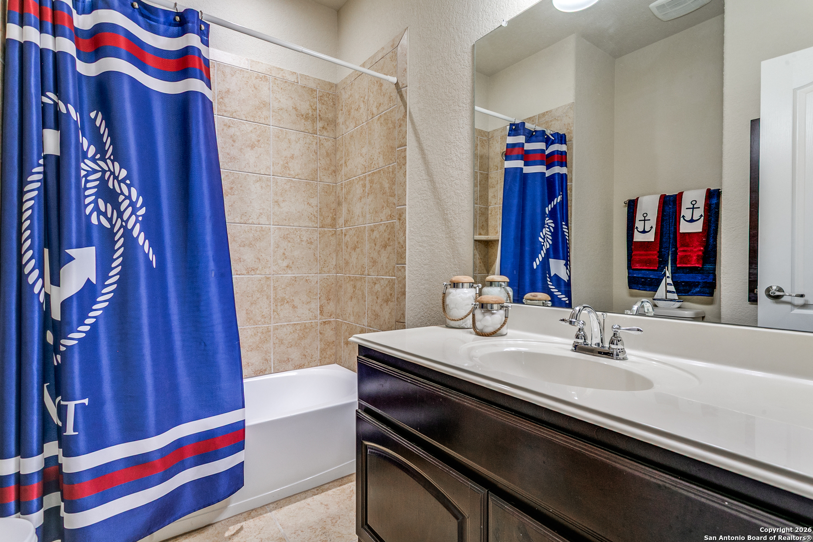 701 Morningside Drive Terrell Hills, TX 78209 - Photo 35 of 47 a bathroom with a sink and a mirror