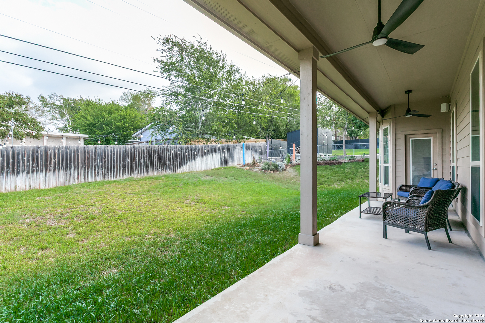 701 Morningside Drive Terrell Hills, TX 78209 - Photo 39 of 47 a view of a chair and table in backyard of the house