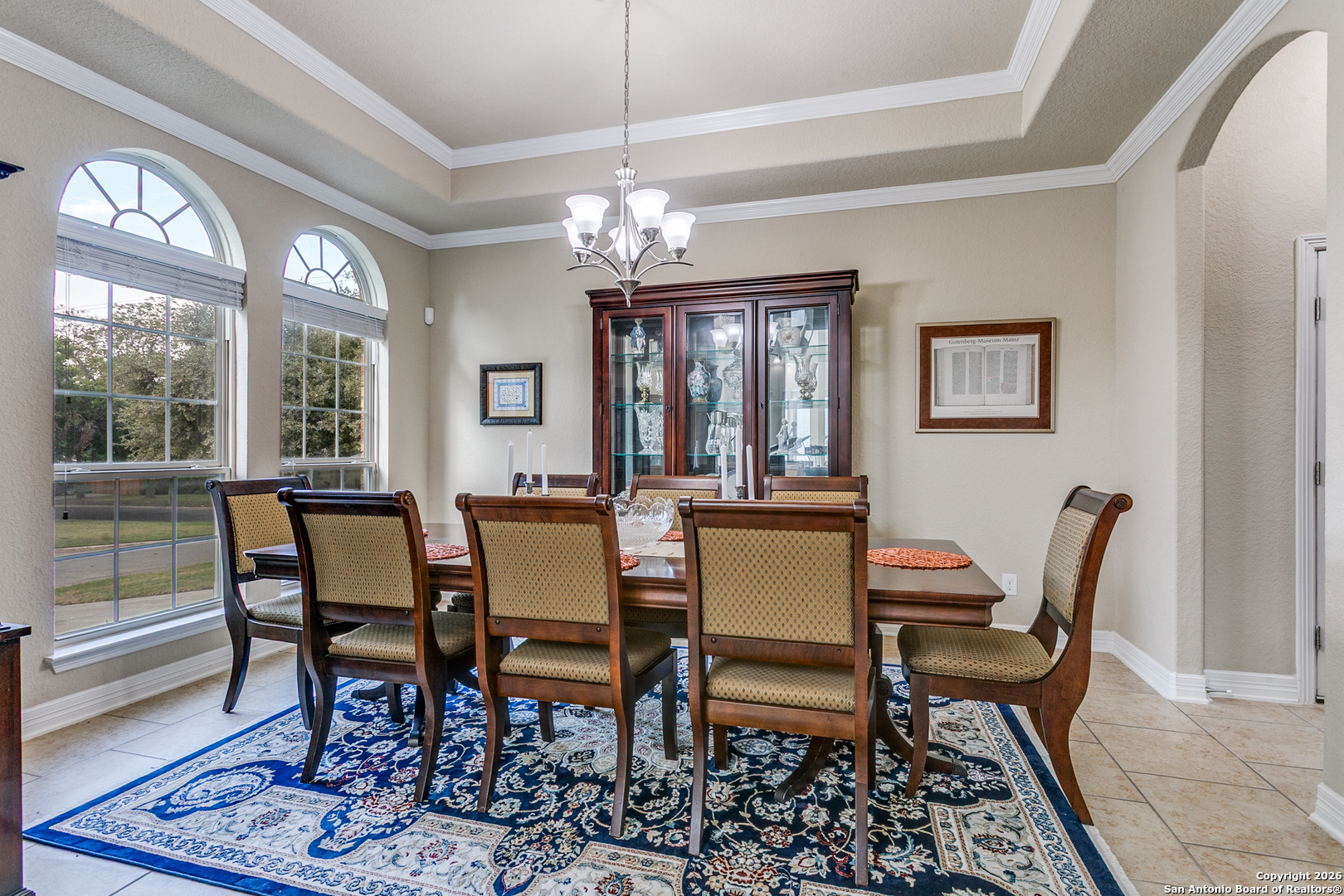 701 Morningside Drive Terrell Hills, TX 78209 - Photo 8 of 47 a view of a dining room with furniture a chandelier and wooden floor