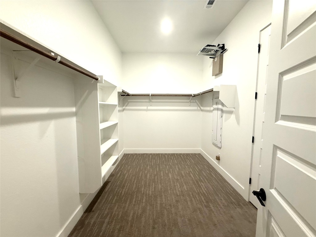2002 Clearlight Lane Georgetown, TX 78633 - Photo 14 of 30 Spacious closet featuring dark colored carpet