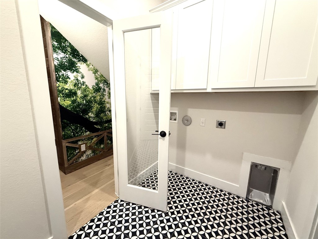 2002 Clearlight Lane Georgetown, TX 78633 - Photo 21 of 30 Laundry room featuring hookup for an electric dryer and hookup for a washing machine