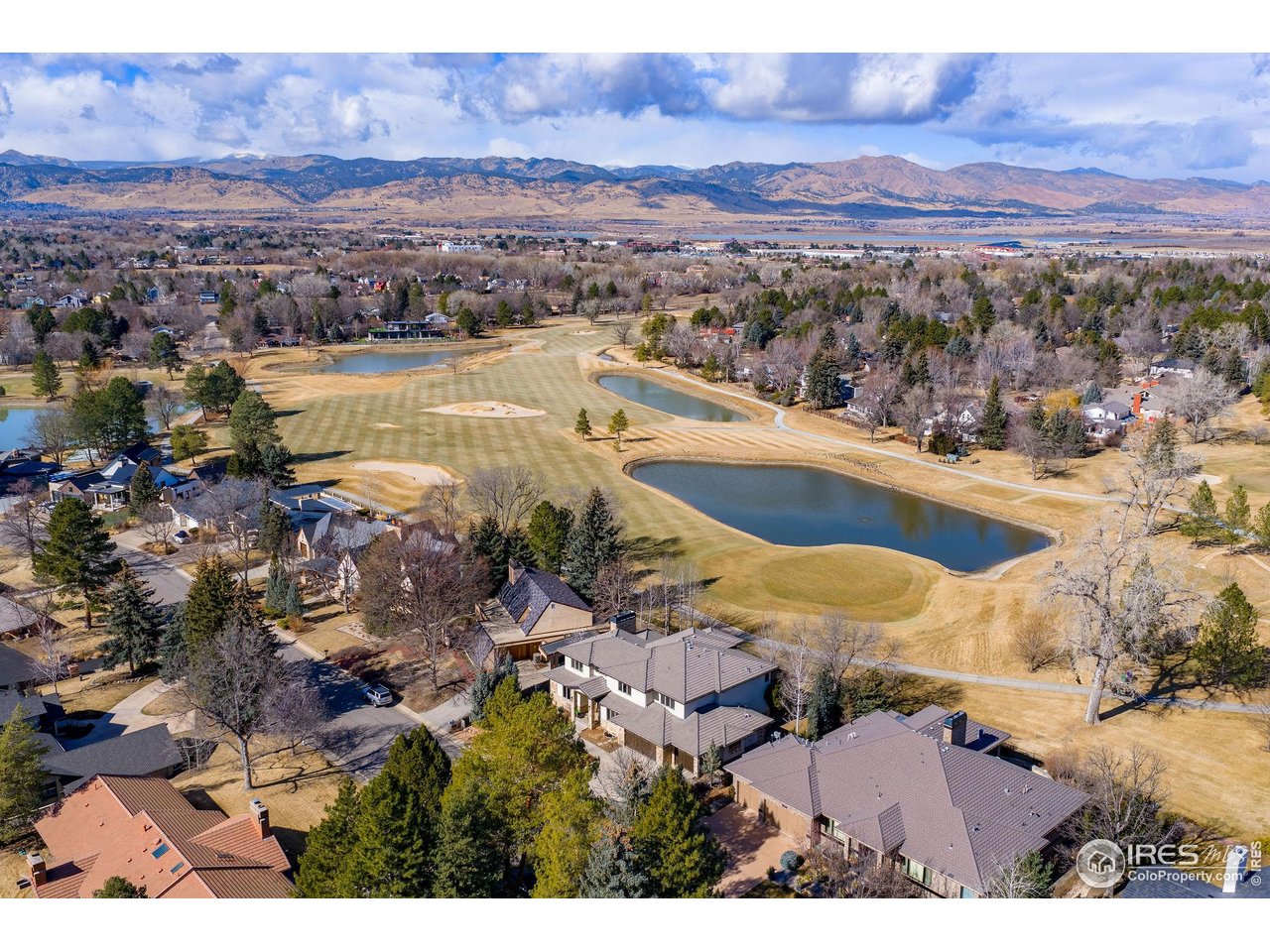 7205 Rustic Trail Boulder, CO 80301 - Photo 3 of 49 a view of a city with mountains in the background