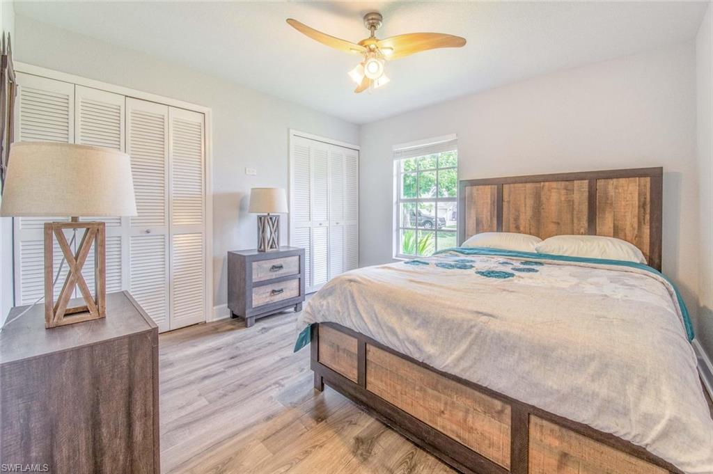 910 Liberty Lane Auburndale, FL 33823 - Photo 24 of 48 a bedroom with a bed dresser and a window