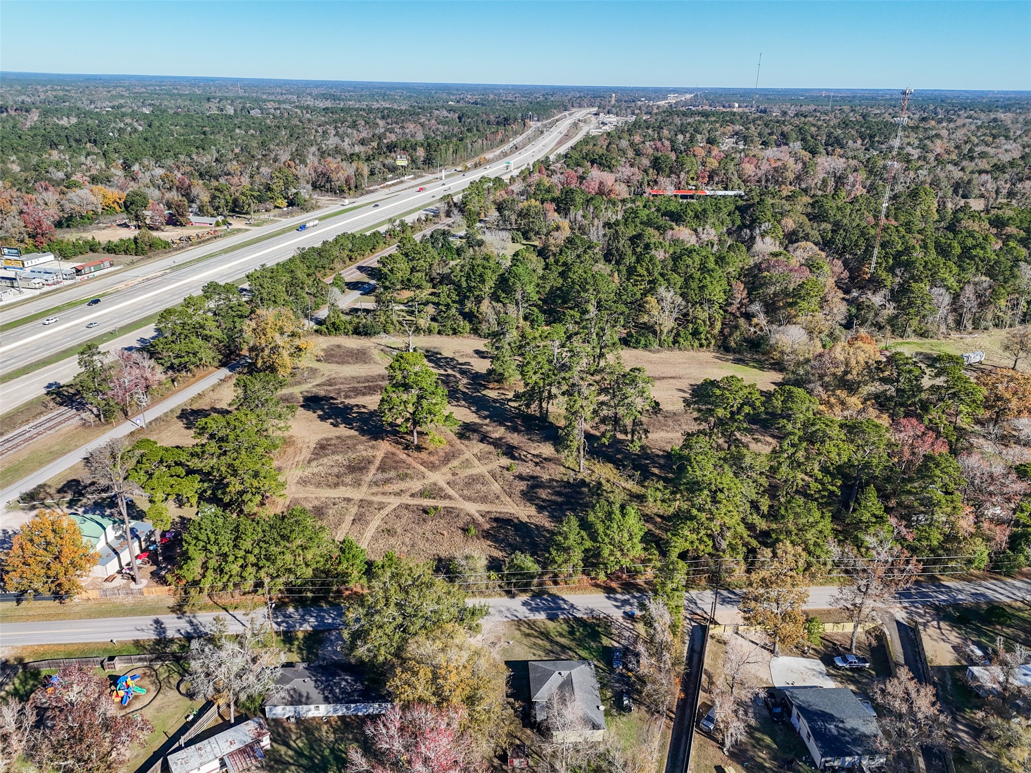 15633 1st Street Splendora, TX 77372 - Photo 4 of 19 an aerial view of a city