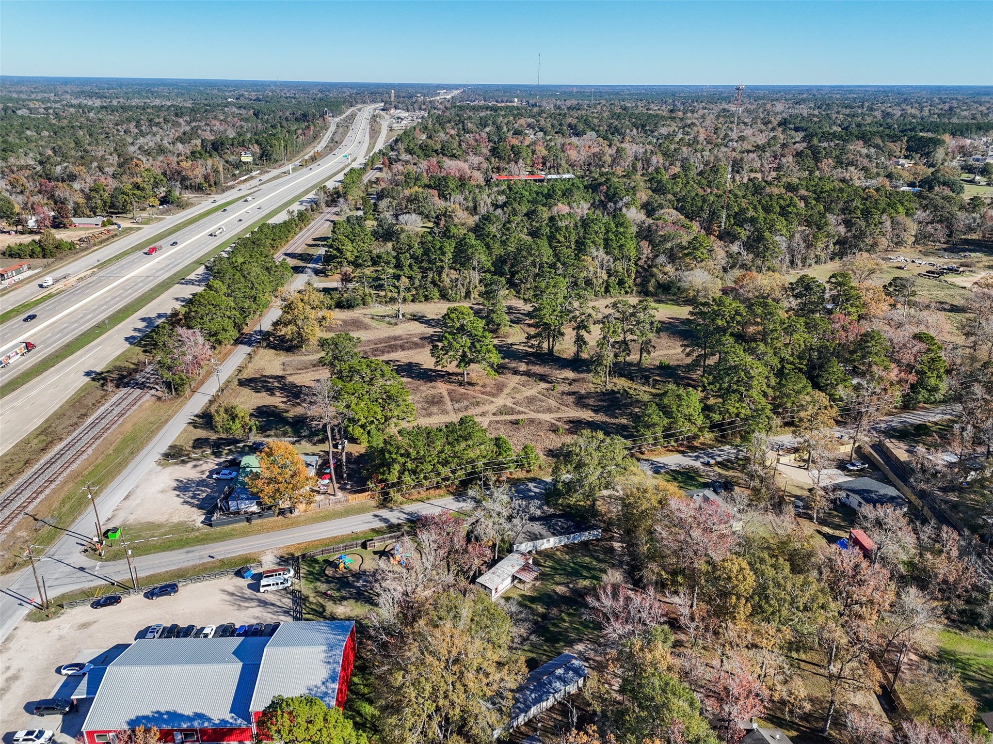 15633 1st Street Splendora, TX 77372 - Photo 5 of 19 a view of a city