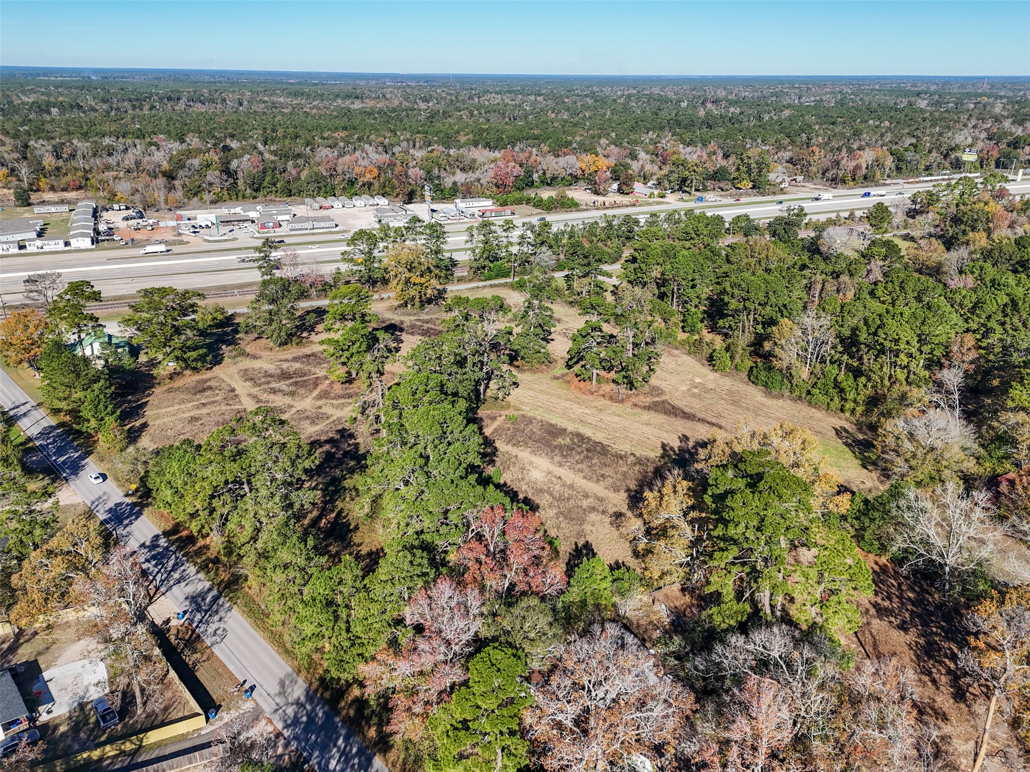 15633 1st Street Splendora, TX 77372 - Photo 6 of 19 a view of a city