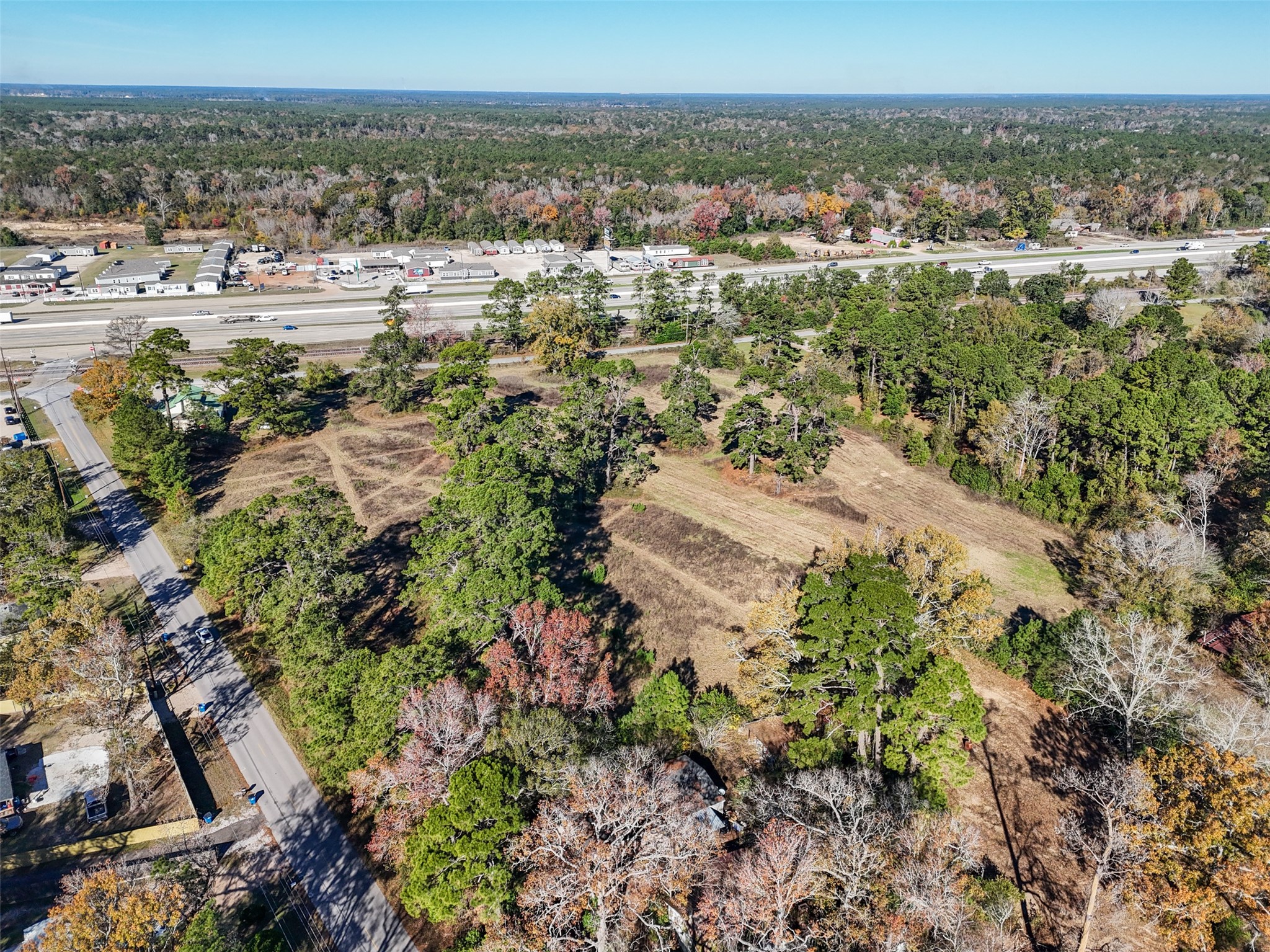 15633 1st Street Splendora, TX 77372 - Photo 7 of 19 a view of a city and mountains