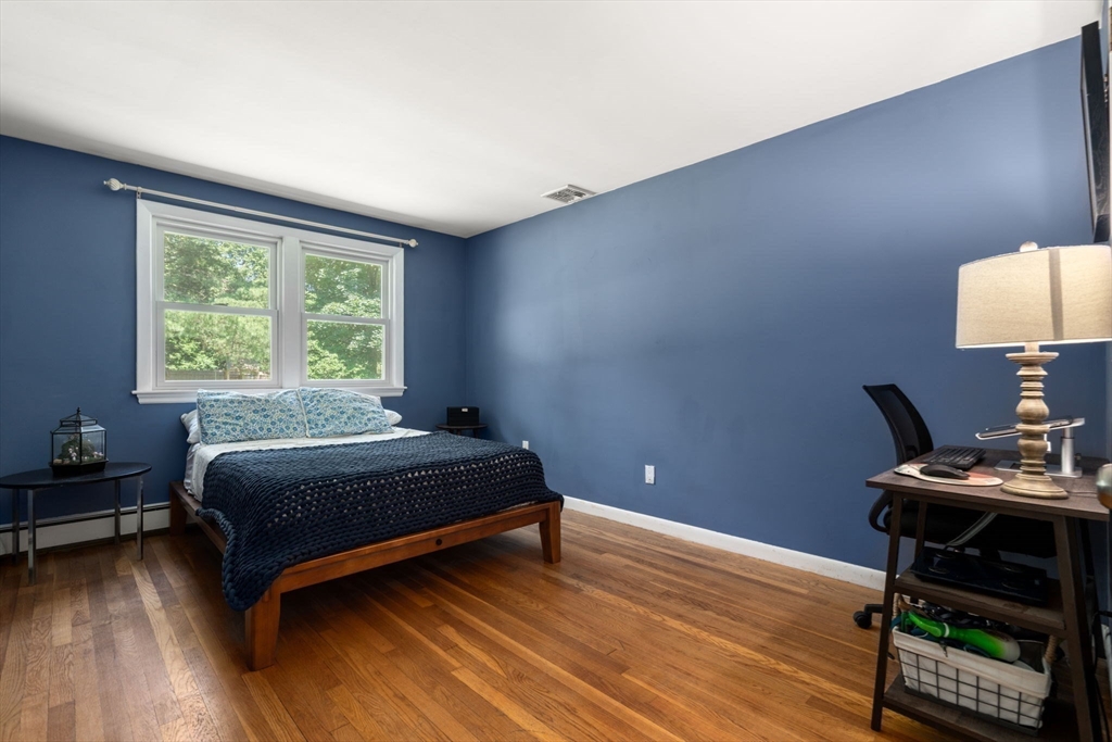 335 Conant Road Weston, MA 02493 - Photo 15 of 31 a bedroom with a bed and a window
