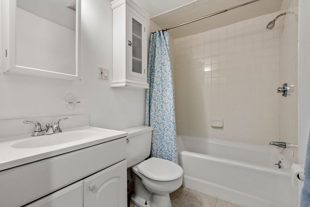335 Conant Road Weston, MA 02493 - Photo 17 of 31 a bathroom with a sink toilet and shower
