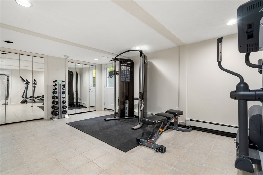 335 Conant Road Weston, MA 02493 - Photo 24 of 31 a view of a room with gym equipment