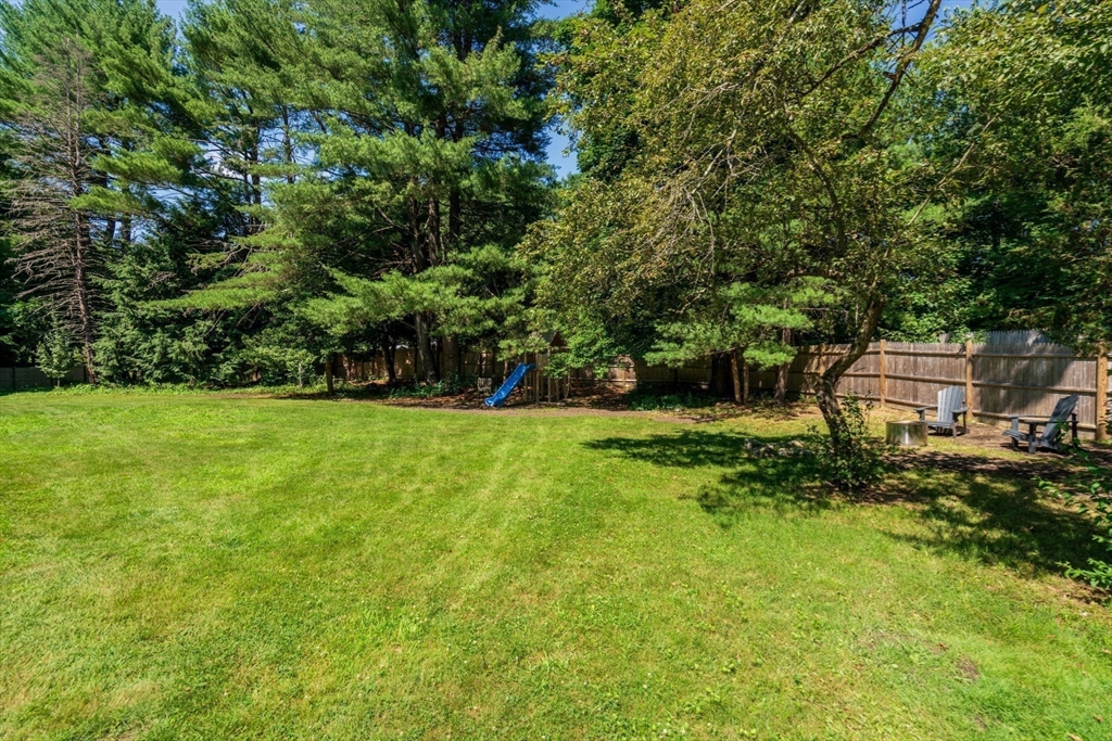 335 Conant Road Weston, MA 02493 - Photo 27 of 31 a view of yard with green space