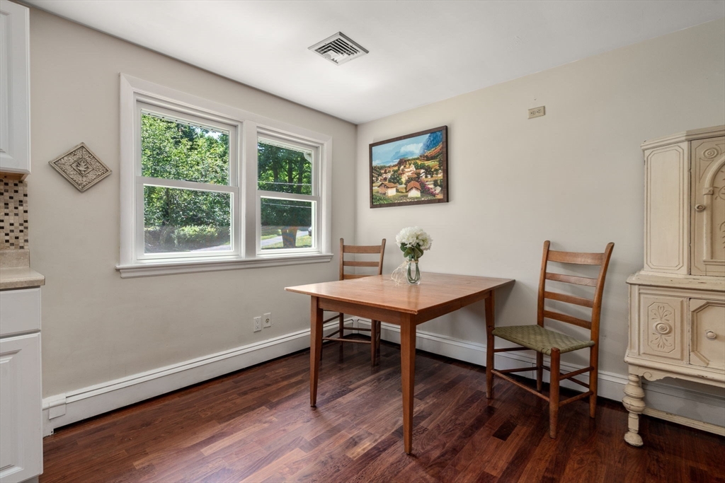 335 Conant Road Weston, MA 02493 - Photo 8 of 31 a view of a workspace with furniture window and wooden floor