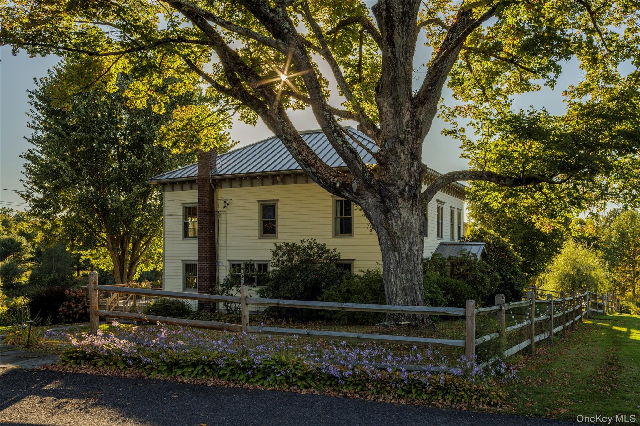 108 Wey Road Rhinebeck, NY 12572 - Photo 2 of 24 front view of a house with a tree