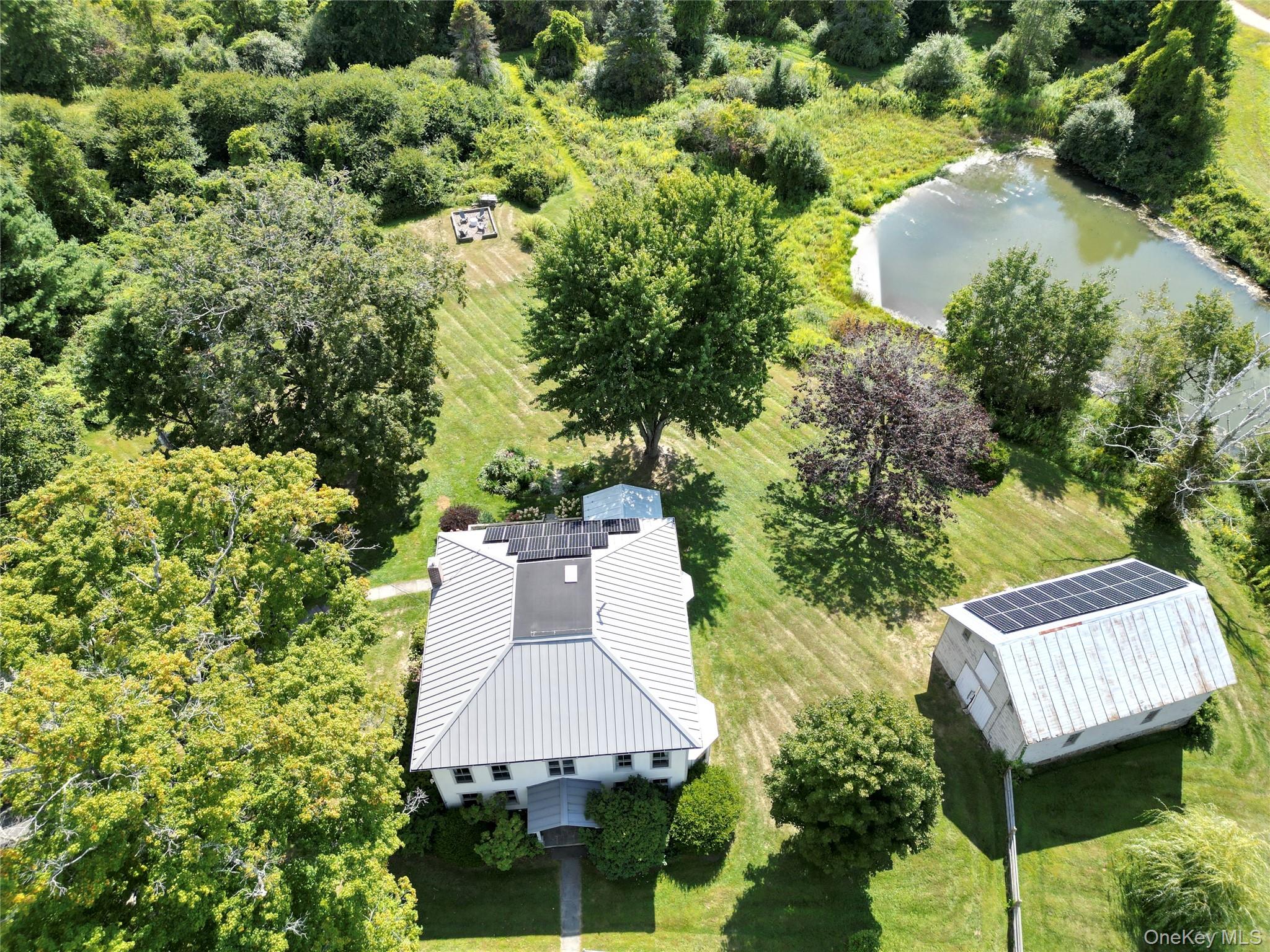 108 Wey Road Rhinebeck, NY 12572 - Photo 23 of 24 an aerial view of a house with a yard and garden