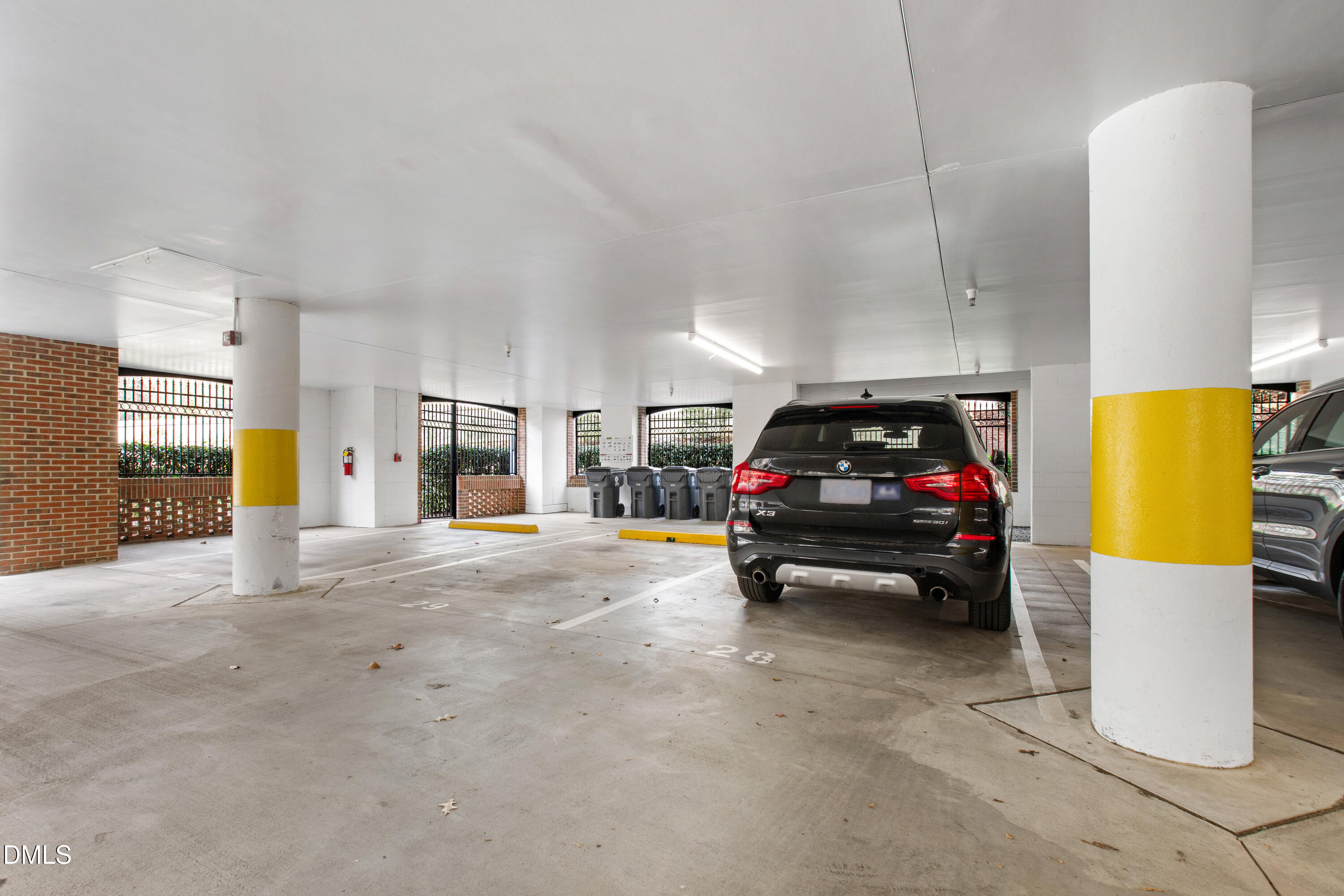 3700 Baron Cooper Pass, Unit 105 Raleigh, NC 27612 - Photo 48 of 49 a view of a car parked in the parking area