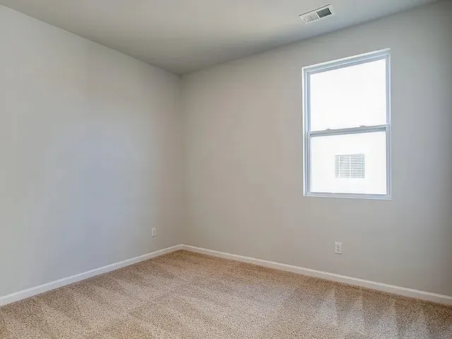 an empty room with a window