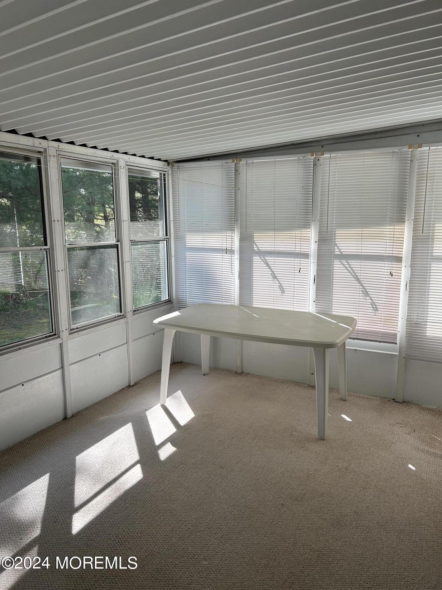 504 Rosalind Road Freehold, NJ 07728 - Photo 6 of 8 a living room with furniture and a window