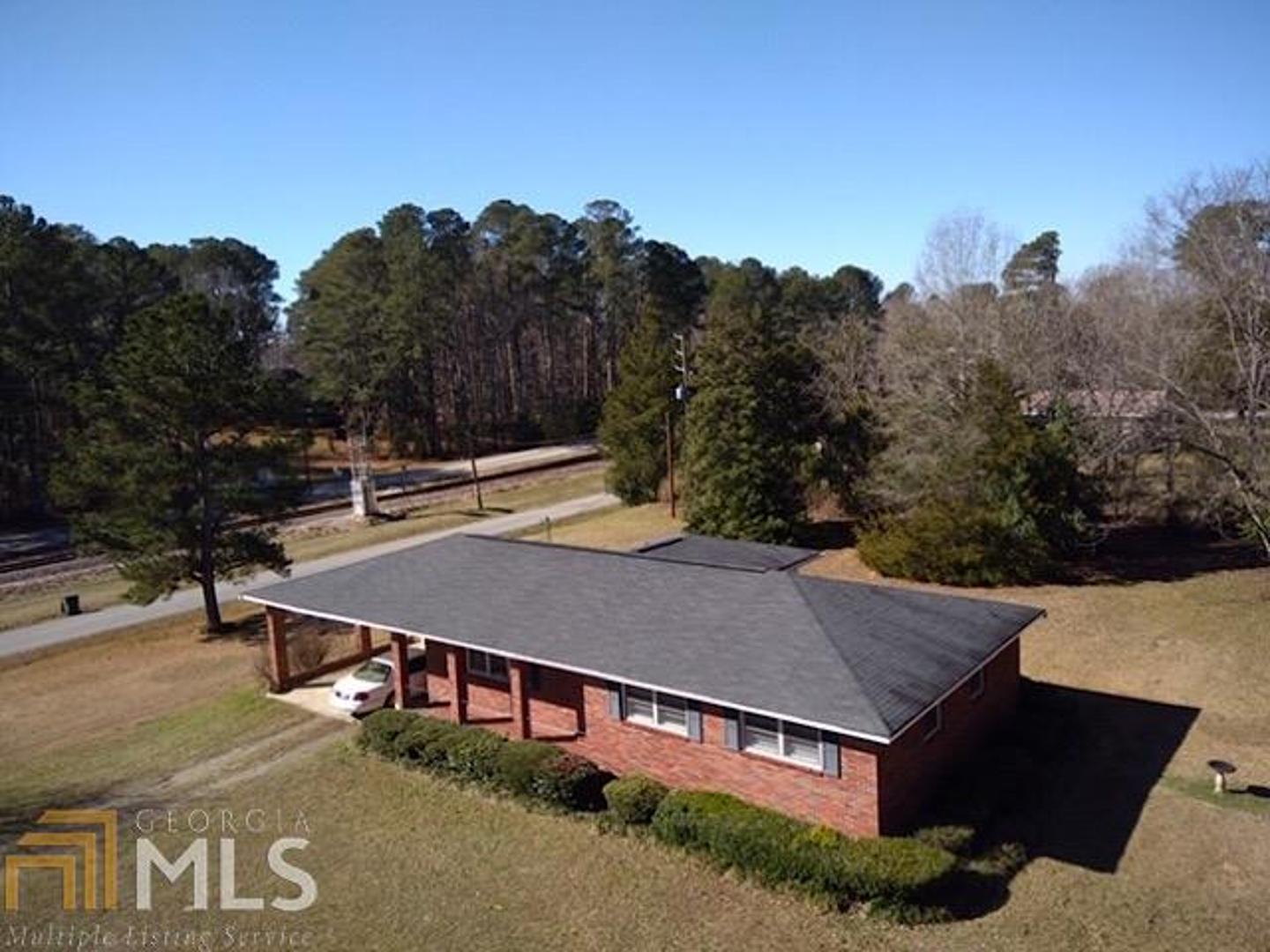 100 Spruce Street Union Point, GA 30669 - Photo 1 of 1 an aerial view of a house