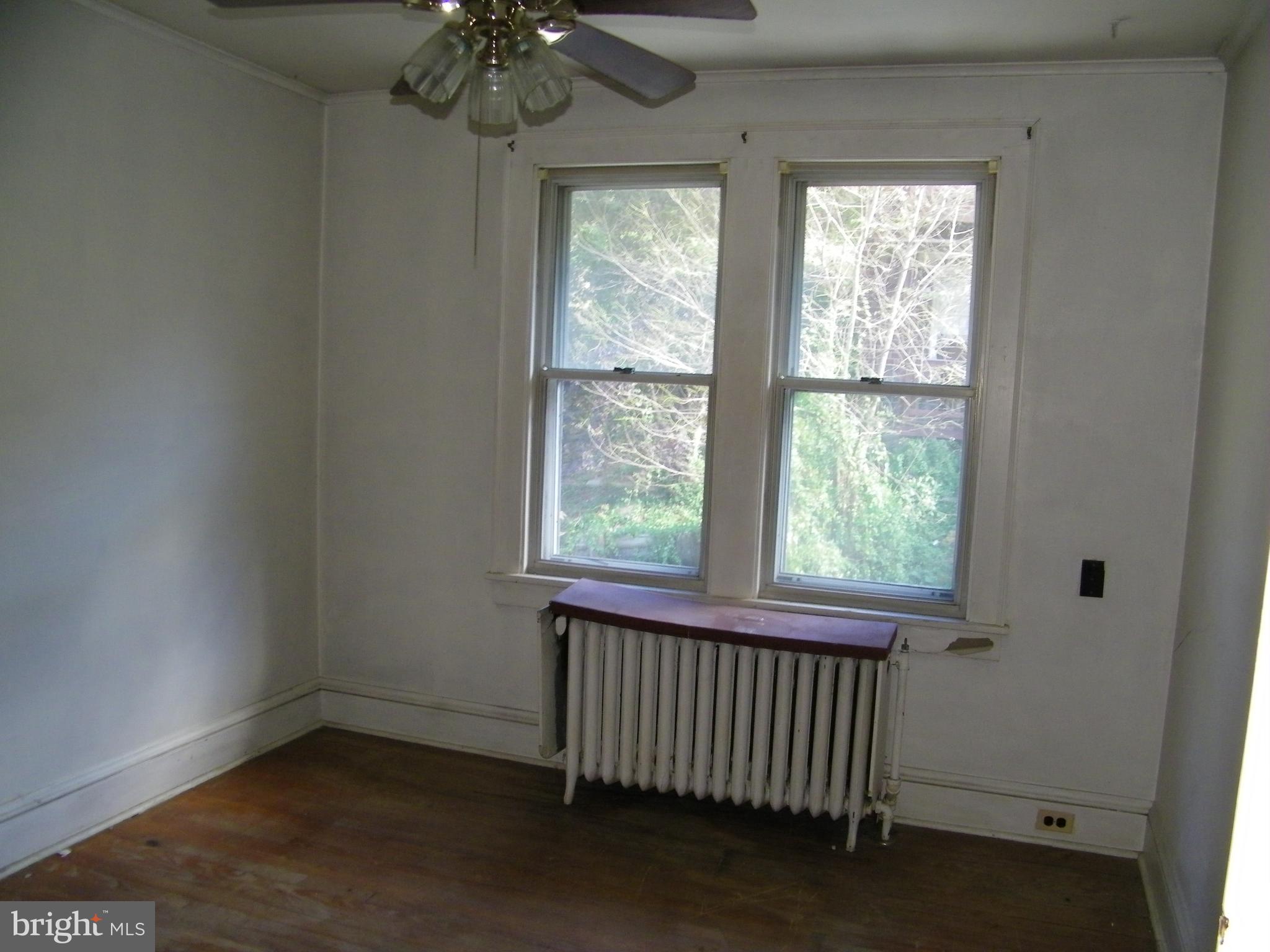 617 Frederick Street Cumberland, MD 21502 - Photo 12 of 16 an empty room with a window