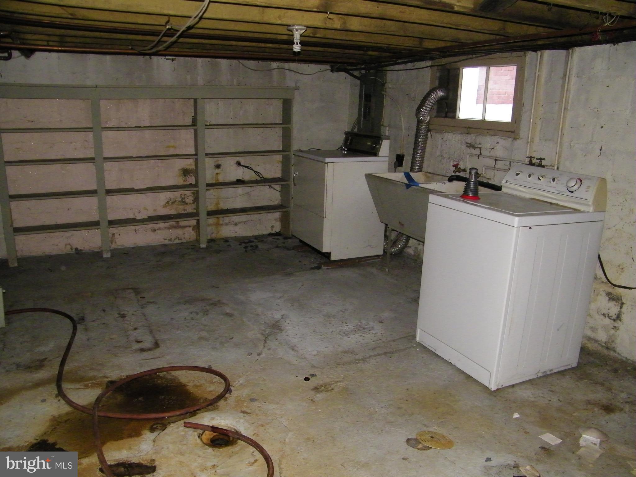 617 Frederick Street Cumberland, MD 21502 - Photo 16 of 16 a utility room with dryer and washer