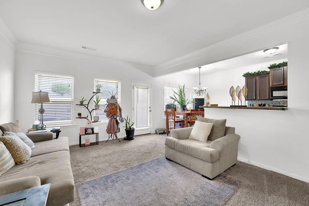 288 Valley Crossing Canton, GA 30114 - Photo 5 of 22 a living room with furniture and a couch