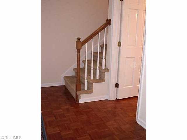 4839 Tower Road, Unit B Greensboro, NC 27410 - Photo 5 of 9 Other. Foyer leads to center hallway with laundry and 1/2 bath, and to main living area.