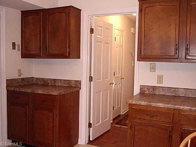 4839 Tower Road, Unit B Greensboro, NC 27410 - Photo 7 of 9 Other. Abundant counter, and cabinet space with easy access to dining area.