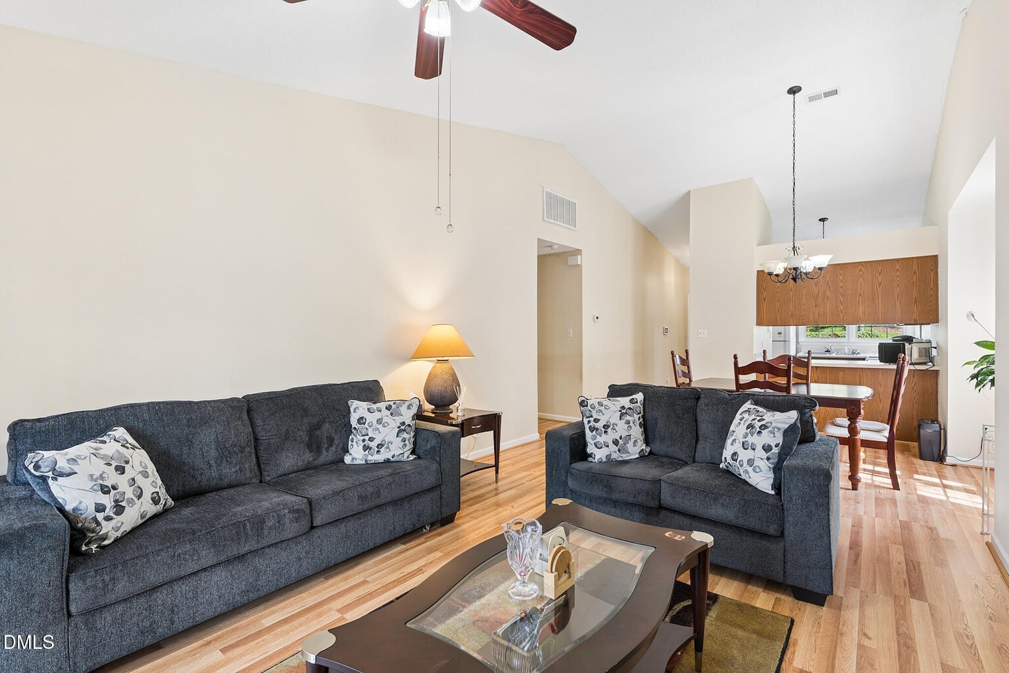 4365 Bona Court Raleigh, NC 27604 - Photo 14 of 29 a living room with furniture and wooden floor