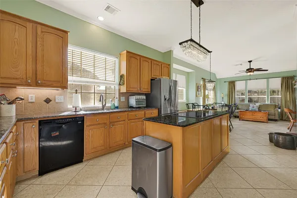 a living room with furniture or couch and a large window